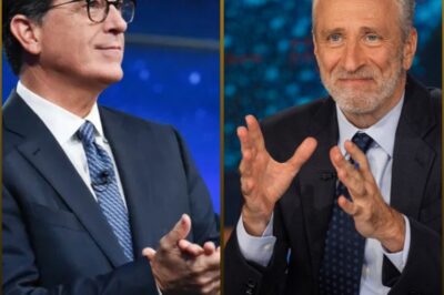 🚨 BREAKING NEWS — Hollywood’s Silent War Just Went Nuclear.  Jon Stewart has issued a bone-chilling ultimatum to Apple: “Buy me a coffin if you want silence.” 💀