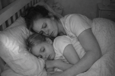 THE PERSON IN MY DAUGHTER’S BED AT 2 A.M. WASN’T A STRANGER — IT WAS MY HUSBAND, CURLED ON THE VERY EDGE OF THE MATTRESS LIKE HE DIDN’T BELIEVE HE DESERVED THE SPACE