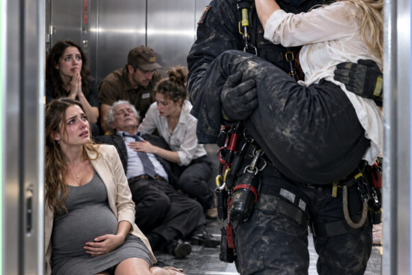 The elevator doors opened after seven hours and sixteen minutes.